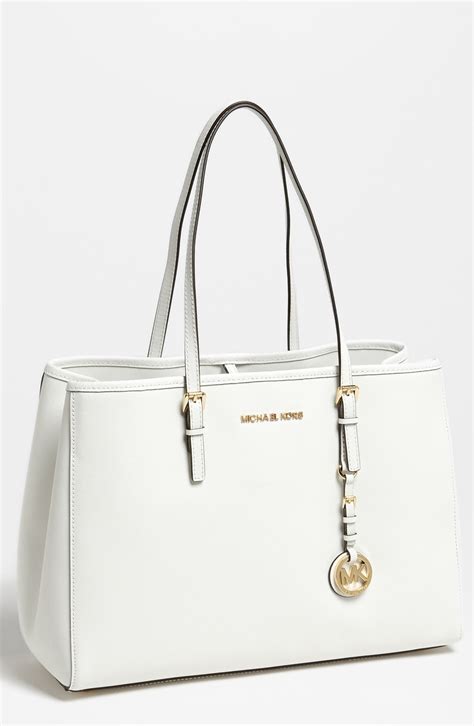 michael kors optic white bag|Michael Kors white backpack purse.